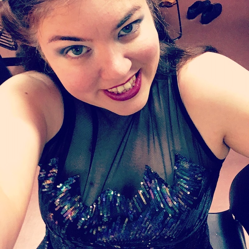 Kat Vancil backstage before a dance show for Tude's School of Dance in a black sparkly dress
